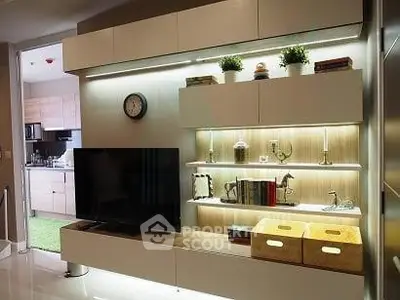 Modern living room with stylish TV unit and open kitchen layout