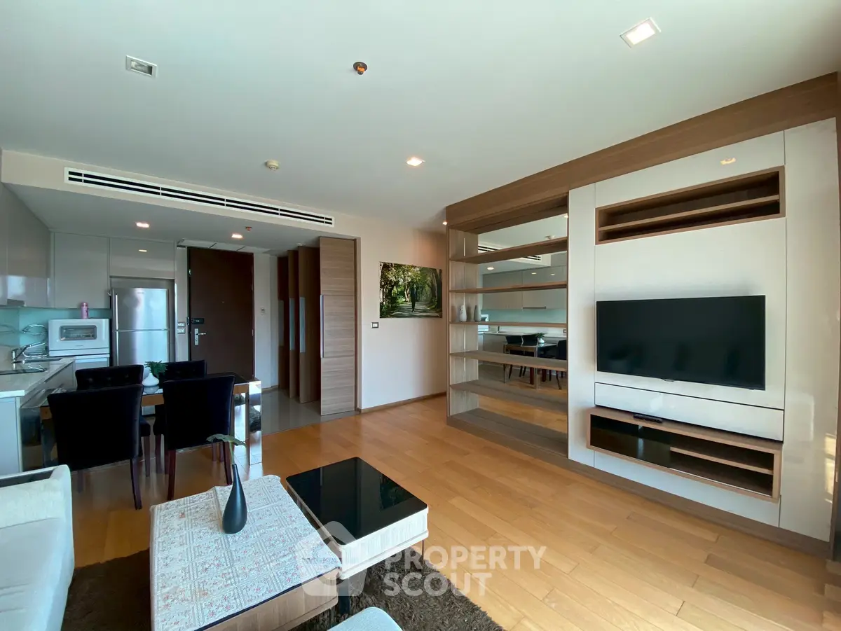 Spacious modern living room with open kitchen and stylish decor