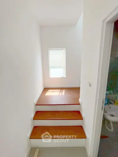 Bright stairway with natural light and modern design