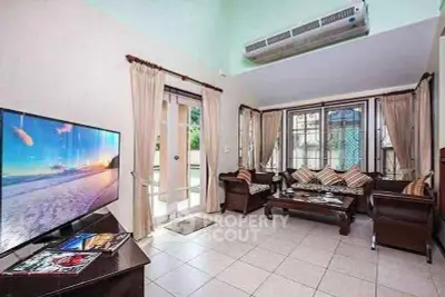 Spacious living room with elegant decor and natural light