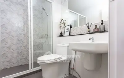 Modern bathroom with sleek design and glass shower enclosure