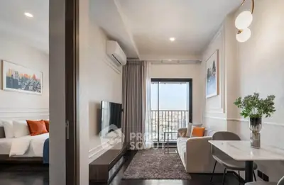 Modern living room with balcony view, stylish decor, and cozy seating area in a contemporary apartment.
