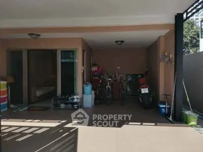 Spacious garage with bikes and storage in modern home