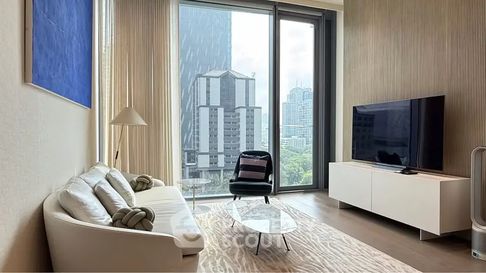 Luxurious living room with modern decor and stunning city view through large windows.