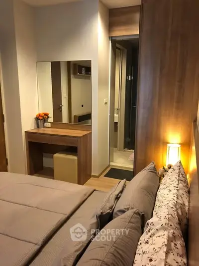 Cozy bedroom with modern decor and ensuite bathroom