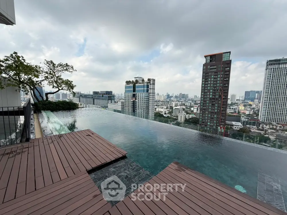 Stunning rooftop infinity pool with panoramic city skyline views