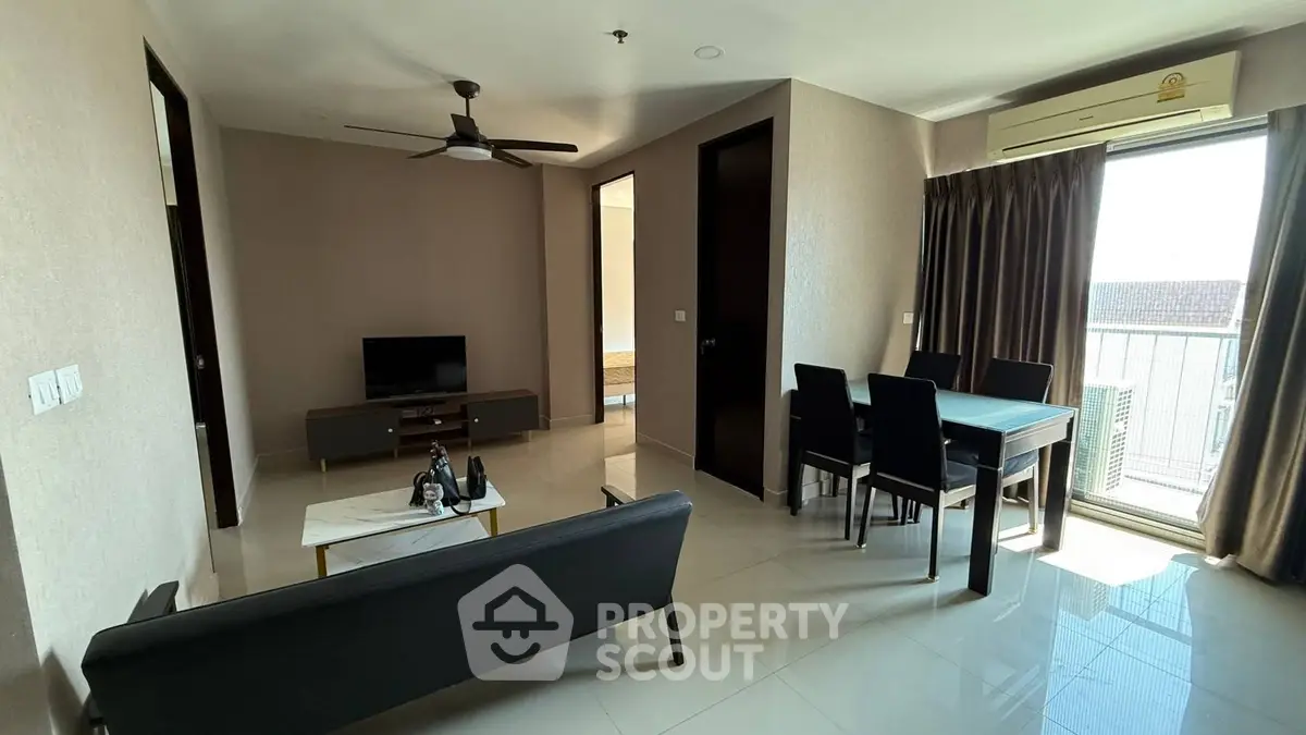 Modern living room with sleek furniture and natural light
