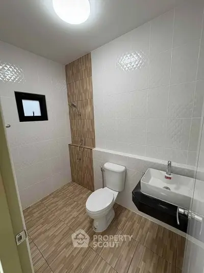 Modern bathroom with sleek fixtures and stylish tile design