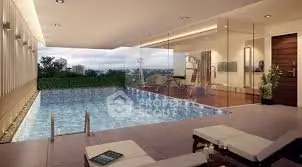 Luxurious indoor pool with stunning view and modern design.