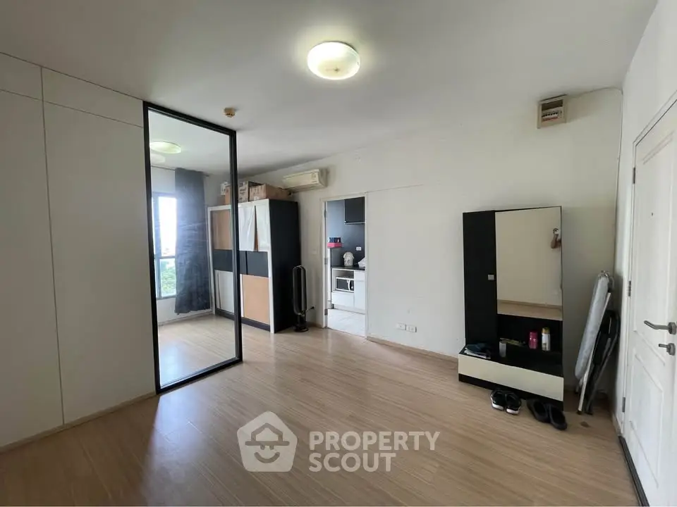 Spacious modern living room with sleek design and ample natural light