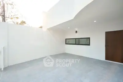 Spacious modern outdoor area with sleek design and natural light