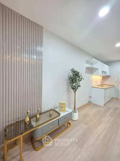 Modern living room with stylish decor and open kitchen layout