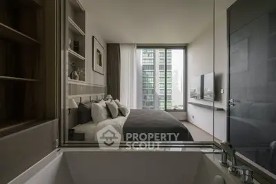 Luxurious bedroom with modern decor and city view from large window