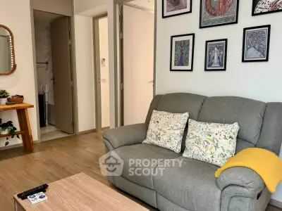 Cozy living room with stylish decor and comfortable seating, perfect for relaxation.