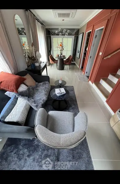Stylish modern living room with elegant decor and cozy seating area