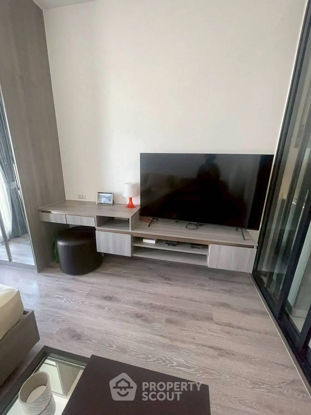 Modern living room with sleek TV unit and stylish decor