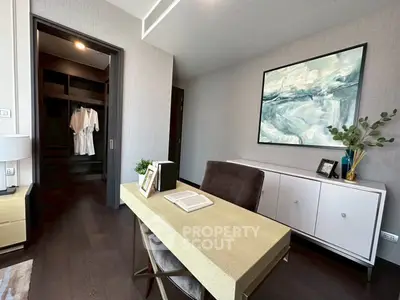 Elegant study room with modern decor and walk-in closet, perfect for productivity and style.