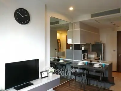 Modern open-layout kitchen with sleek appliances and stylish decor