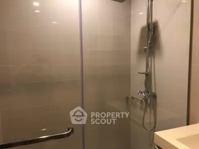 Modern bathroom with sleek shower design and glass enclosure