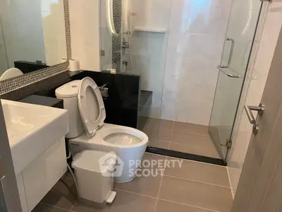 Modern bathroom with sleek design and glass shower enclosure