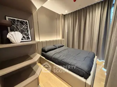 Modern bedroom with stylish decor and cozy ambiance, featuring elegant lighting and contemporary furnishings.