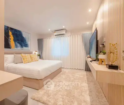 Luxurious modern bedroom with stylish decor and cozy ambiance