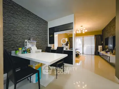 Modern living room with sleek dining area and stylish decor