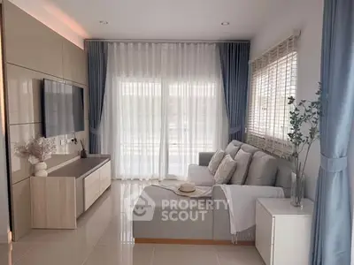 Modern living room with elegant decor and natural light