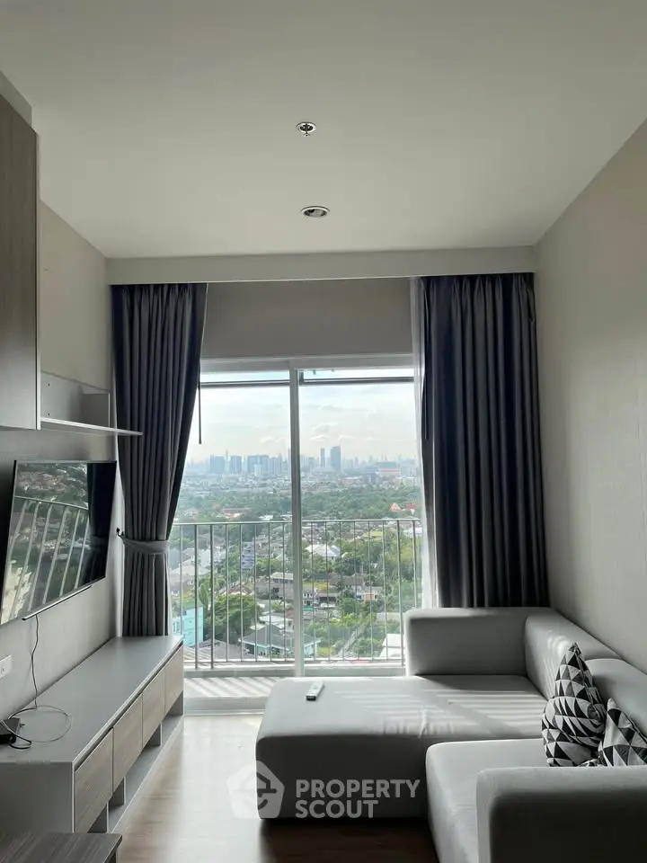 Modern living room with panoramic city view and stylish furnishings