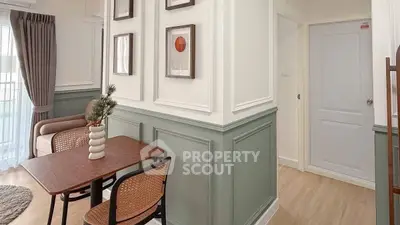 Charming living room with elegant decor and natural light in modern apartment