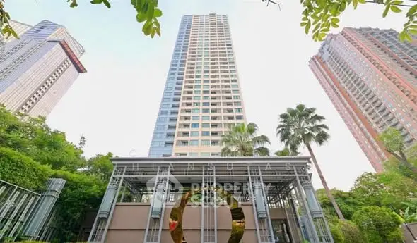 Stunning high-rise building with lush greenery and modern architecture