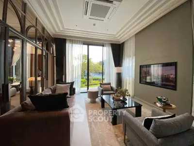 Luxurious living room with elegant decor and garden view, featuring plush seating and modern design.