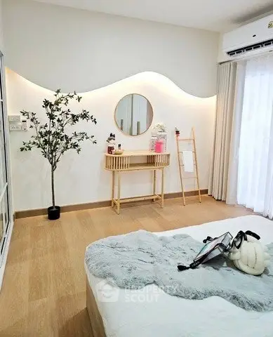 Stylish bedroom with modern decor and natural light