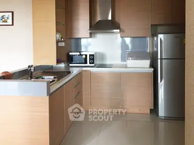 Modern kitchen with sleek cabinetry, stainless steel appliances, and ample counter space.