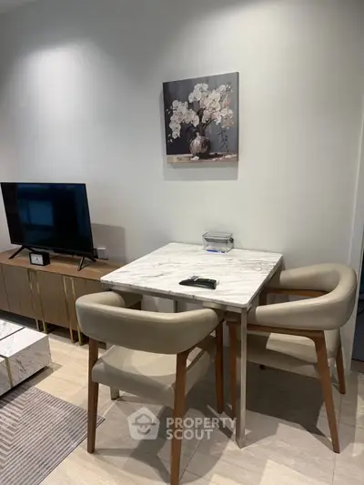 Modern living room with elegant dining area and stylish decor