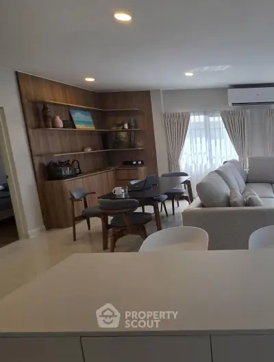 Modern living room with stylish furniture and open layout