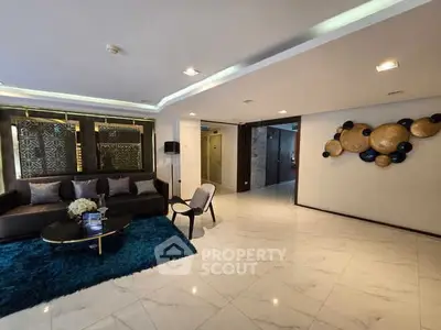 Luxurious modern living room with elegant decor and plush seating