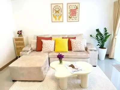 Stylish living room with modern decor and cozy seating area.