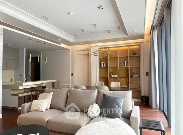 Spacious modern living room with open kitchen and elegant decor