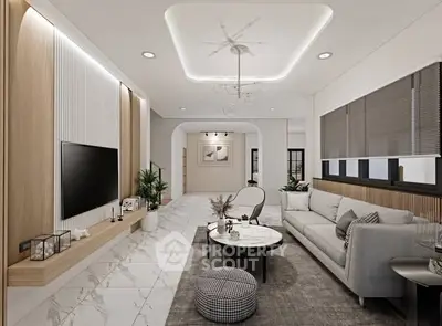 Modern living room with elegant decor and stylish furniture, featuring a sleek TV setup and cozy seating area.