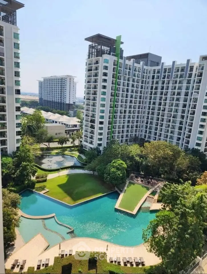 Luxurious high-rise building with stunning pool and landscaped gardens