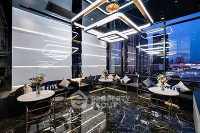 Luxurious modern living room with city view and elegant decor