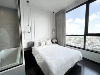 Luxurious bedroom with stunning city view and elegant decor