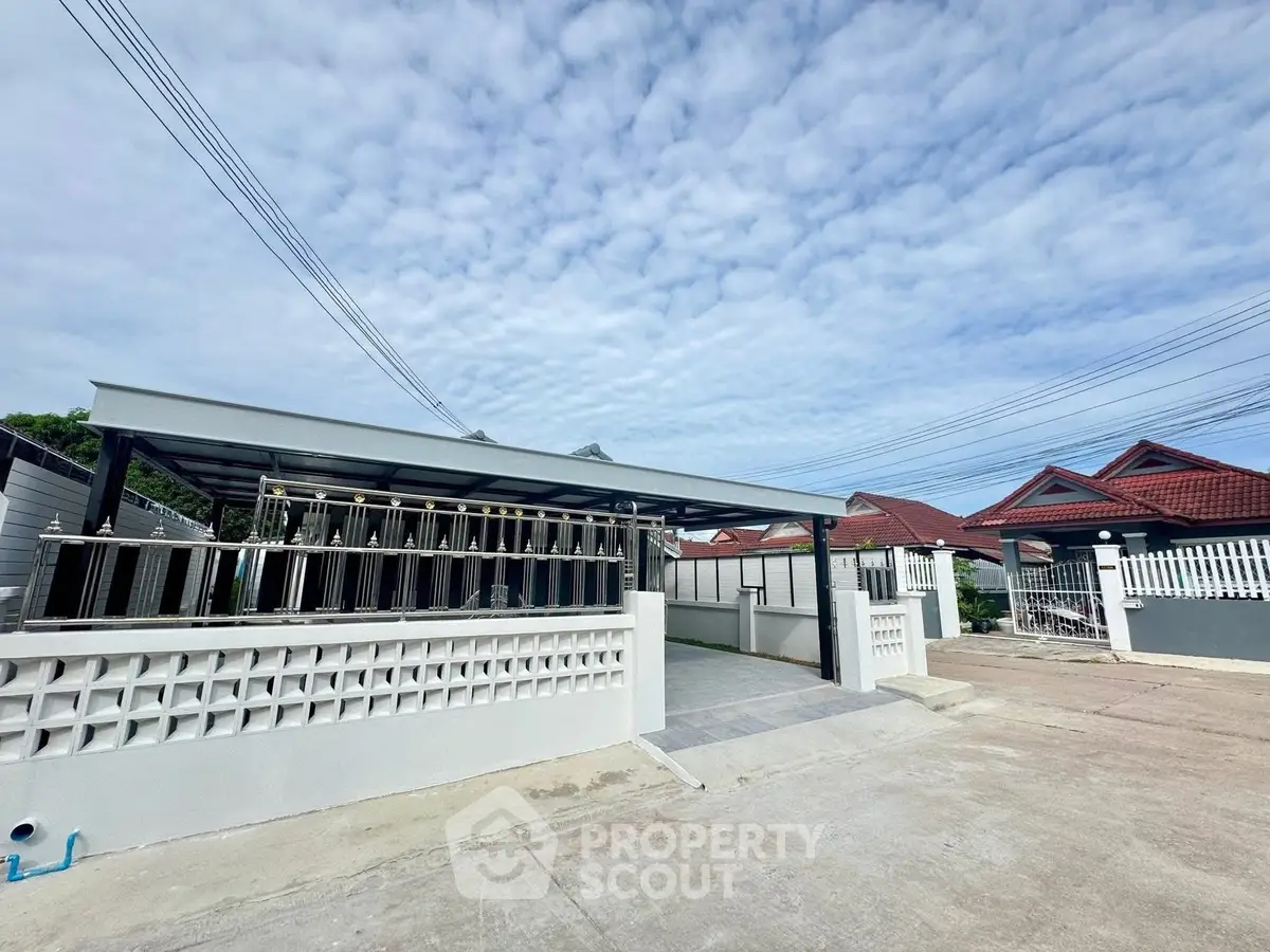Spacious modern driveway with covered parking in suburban home