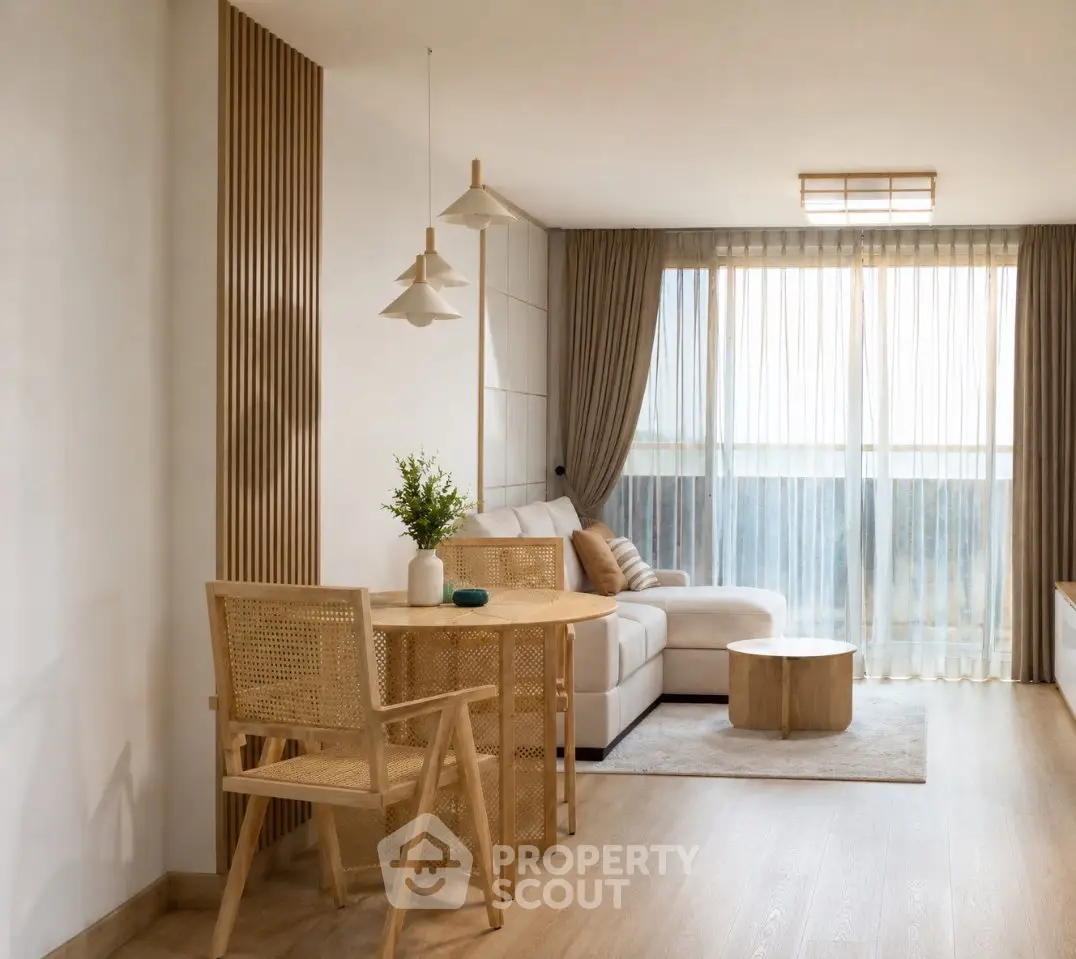 Elegant living room with natural light, wooden furniture, and cozy seating area.