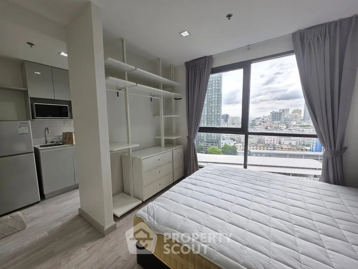 Modern bedroom with city view and open closet design
