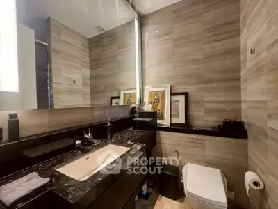 Luxurious modern bathroom with elegant marble sink and stylish decor