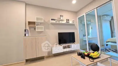 Modern living room with sleek TV unit and cozy decor