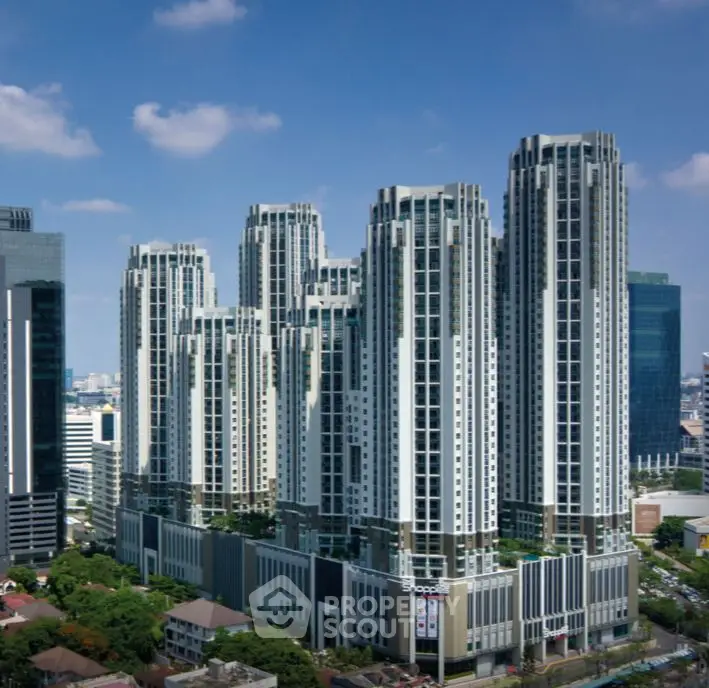 Stunning modern high-rise buildings with sleek architecture in urban skyline.