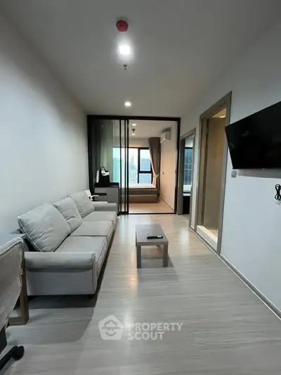 Modern living room with sleek design and cozy ambiance